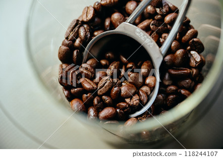 Coffee beans stored in a coffee canister Coffee beans stored in a coffee canister 118244107