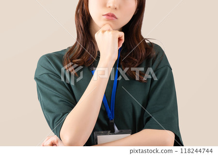 Young business woman thinking Young business woman thinking 118244744