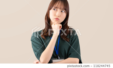 Young business woman thinking Young business woman thinking 118244745