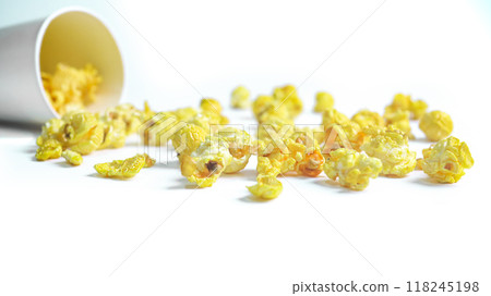 Isolated image of popcorn in a paper cup set against a white background, showcasing the fluffy, golden kernels spilling over the edges, perfect for themes related to snacks, cinema, or casual dining. Isolated image of popcorn in a paper cup set against a white background, showcasing the fluffy, golden kernels spilling over the edges, perfect for themes related to snacks, cinema, or casual dining. 118245198