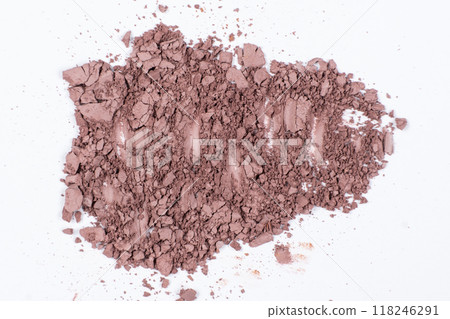 Scattered dry eyeshadow on white background close-up. Scattered dry eyeshadow on white background close-up. 118246291