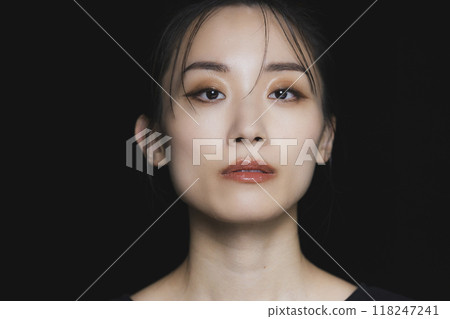 Woman on a black background Woman on a black background 118247241