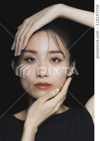 Woman on a black background Woman on a black background 118247256