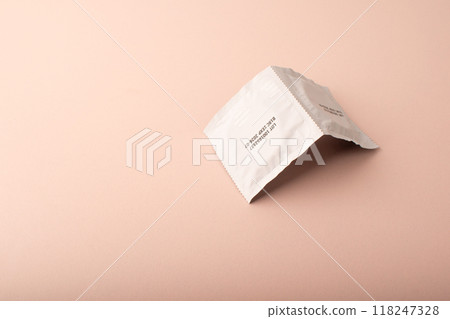 Condoms on pink colored background. Mens contraception. Sexually transmitted diseases infections protection. Concept of birth control. Safe sex. STD. Copy space. High quality photo Condoms on pink colored background. Mens contraception. Sexually transmitted diseases infections protection. Concept of birth control. Safe sex. STD. Copy space. High quality photo 118247328
