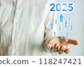 A person is holding a hand up with a blue and white background 2025 concept 118247421