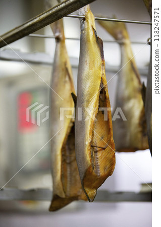 Smoked mackerel close-up. Fishing industry.Mackerel in a smoking oven. Smoked mackerel close-up. Fishing industry.Mackerel in a smoking oven. 118247571