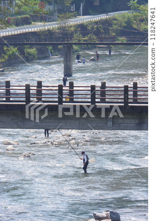People enjoying fishing in the Yoshino River in Nara Prefecture People enjoying fishing in the Yoshino River in Nara Prefecture 118247641