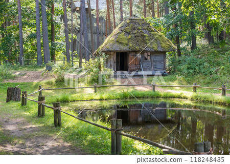 Ancient Old wooden houses in folk style. Latvia. Riga. Ancient Old wooden houses in folk style. Latvia. Riga. 118248485