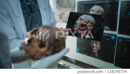 Scientists study anatomy of fossil skull using tablet with created 3D model of Neanderthals 118248734