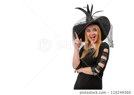 Beautiful woman in a black witch hat looks at the camera with delight and surprise. Halloween costume, white background, space for text Beautiful woman in a black witch hat looks at the camera with delight and surprise. Halloween costume, white background, space for text 118249360