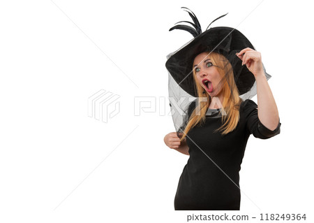 Surprised young woman in black witch hat looking in the camera. Space for text. Halloween party, white background. Surprised young woman in black witch hat looking in the camera. Space for text. Halloween party, white background. 118249364