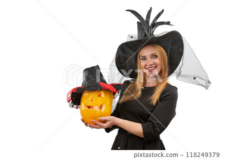 Attractive smiling woman in black witch hat with . White background. Halloween costume party. Attractive smiling woman in black witch hat with . White background. Halloween costume party. 118249379