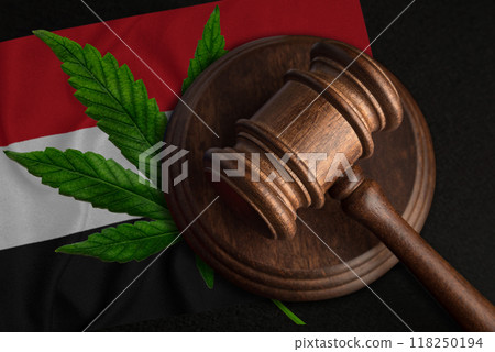 Marijuana leaf and judge gavel on the Yemen flag background. Concept of legalization of marijuana 118250194