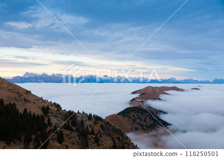 Mountain peaks emerging from the clouds Mountain peaks emerging from the clouds 118250501