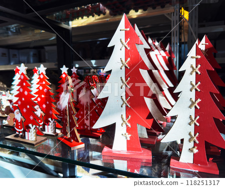 Christmas decoration, cardboard DIY handcrafted trees on store shelf, trade Christmas decoration, cardboard DIY handcrafted trees on store shelf, trade 118251317
