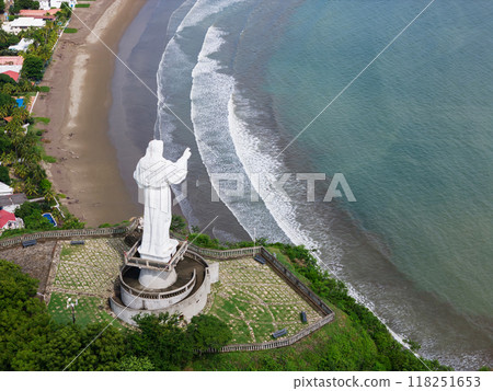Jesus christ statue monument on green sea background 118251653