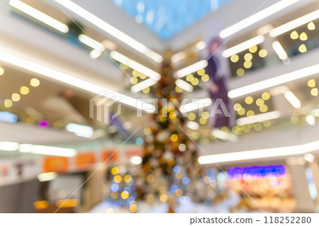 Blurred defocused image of beautifully decorated Christmas tree Blurred defocused image of beautifully decorated Christmas tree 118252280