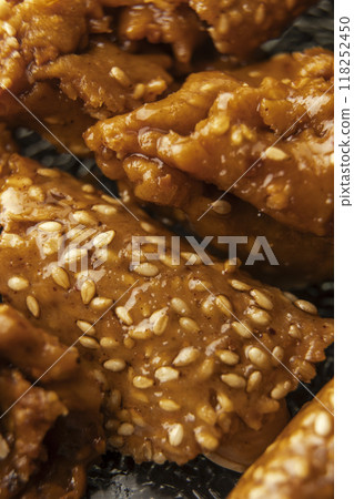 View of a plate of shebaquia, typical sweet of the month of Ramadan in Morocco View of a plate of shebaquia, typical sweet of the month of Ramadan in Morocco 118252450