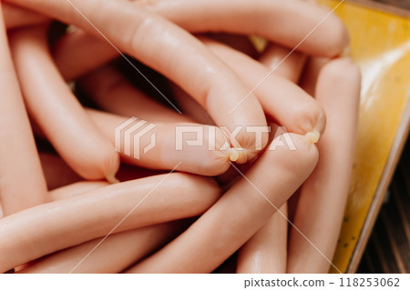 Stack of sausages on a plate, perfect for food presentations, cooking visuals, and menu designs Stack of sausages on a plate, perfect for food presentations, cooking visuals, and menu designs 118253062
