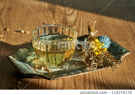 Chamomile tea table photo 118254178
