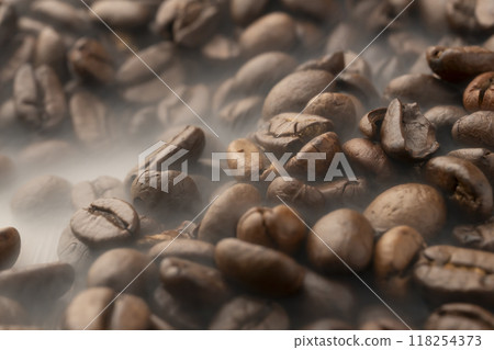 Coffee beans Steam rising from roasted coffee beans Coffee beans Steam rising from roasted coffee beans 118254373