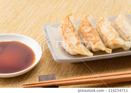 Delicious looking roasted dumplings 118254711