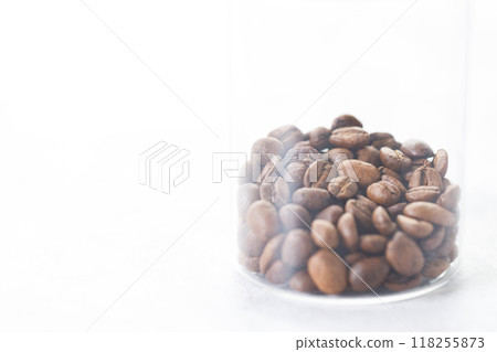 Aromatic flavorful Roasted Specialty Coffee Beans on white Background 118255873