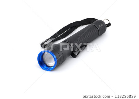 Black flashlight with a blue lens and wrist strap isolated on white background Black flashlight with a blue lens and wrist strap isolated on white background 118256859
