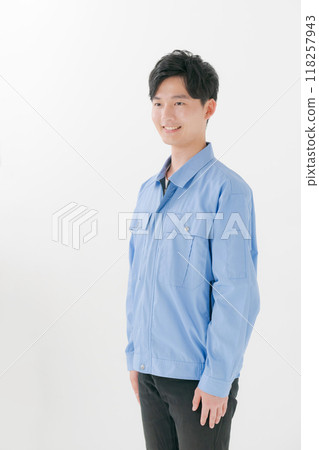 A young man wearing work clothes A young man wearing work clothes 118257943