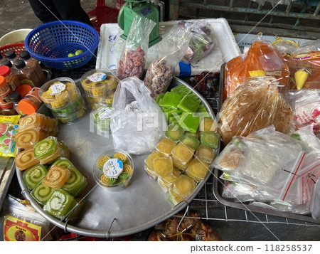 Sweets and snacks sold at a Vietnamese market Sweets and snacks sold at a Vietnamese market 118258537
