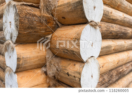 Exterior details of rural wooden house made of logs Exterior details of rural wooden house made of logs 118260005