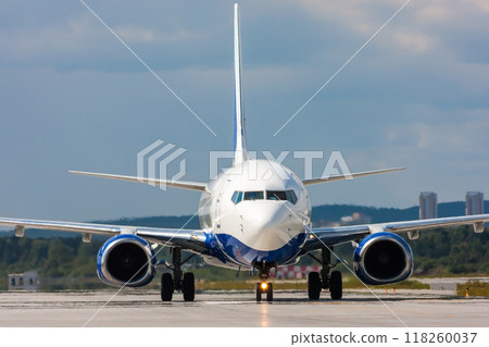 Close up image of passenger airplane on the runway 118260037