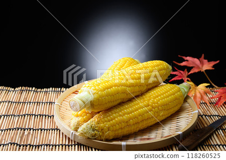 Freshly boiled corn (black background) Freshly boiled corn (black background) 118260525