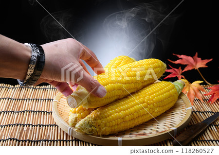 Freshly boiled corn (black background) Freshly boiled corn (black background) 118260527
