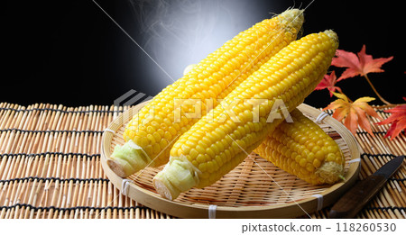 Freshly boiled corn (black background) Freshly boiled corn (black background) 118260530