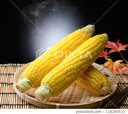 Freshly boiled corn (black background) Freshly boiled corn (black background) 118260531
