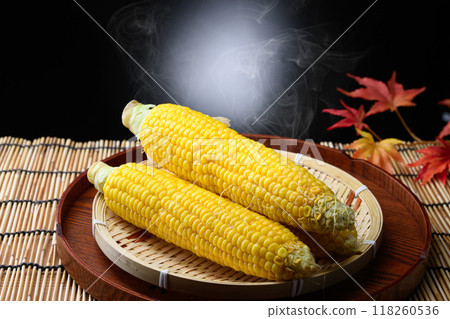 Freshly boiled corn (black background) Freshly boiled corn (black background) 118260536