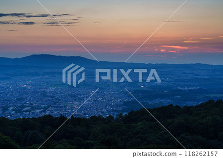 Early autumn evening view of Mount Wakakusa in Nara. From the sunset sinking into the foothills of Mount Ikoma through the beautiful sunset sky to the night view #14 118262157