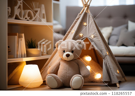 Cute baby room with toy bear and teepee tent, ideal for cozy nursery decor and child's playroom inspiration 118265557