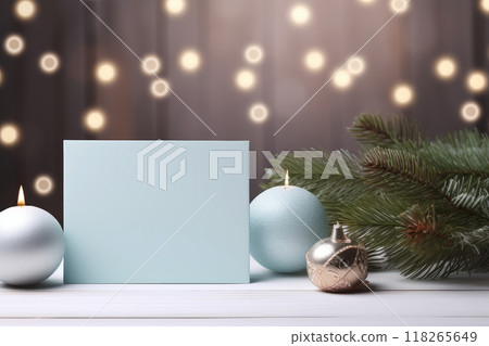 Blank Christmas card mockup with baubles, candles, and pine branches, holiday invitations or seasonal greetings 118265649