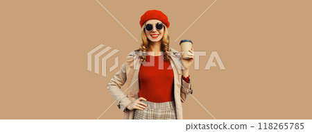 Autumn fashion, portrait of beautiful happy smiling young woman, stylish girl with cup coffee drink Autumn fashion, portrait of beautiful happy smiling young woman, stylish girl with cup coffee drink 118265785