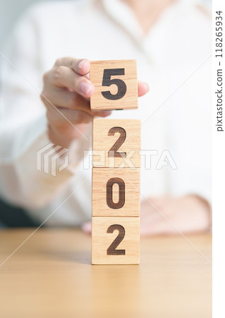 2025 year calendar block on table. goal, Resolution, strategy, plan, start, budget, mission, action, motivation and New Year concepts 118265934