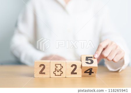 2024 year change to 2025 year block with jigsaw puzzle icon. Business Process, Team, teamwork, Goal, mission, Resolution, strategy, plan, Action, partnership, and New Year start 118265941