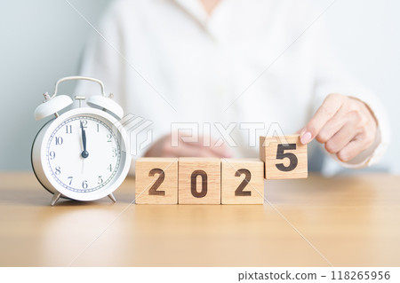 Happy New Year 2025 with vintage alarm clock. Christmas, New Start, Resolution, countdown, Goals, Plan, Action and Motivation Concept 118265956