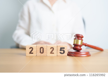 Happy New Year 2025 with judge gavel on table. Law, lawyer, judgment, justice auction and bidding concept 118265992