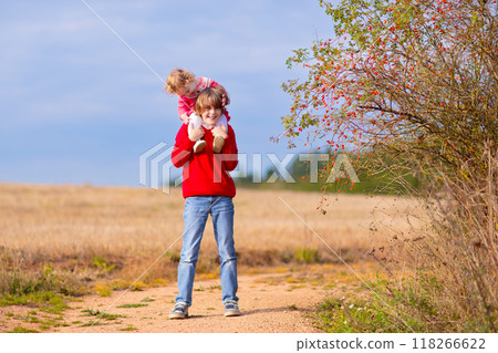 Kids playing in autumn park 118266622