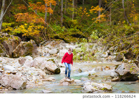 Family with kids hiking in the mountains Family with kids hiking in the mountains 118266624
