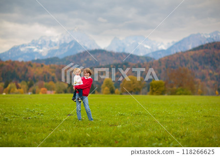 Family with kids hiking in the mountains Family with kids hiking in the mountains 118266625