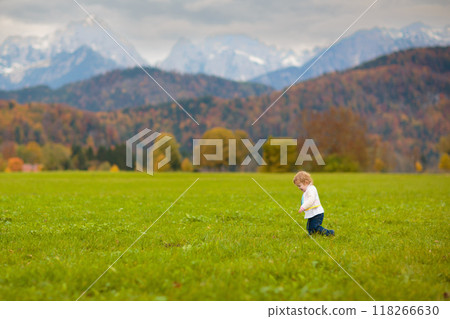 Family with kids hiking in the mountains Family with kids hiking in the mountains 118266630