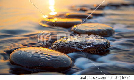 Warming stones and flowing water are arranged artfully to promote balance, healing, and well-being. 118266755